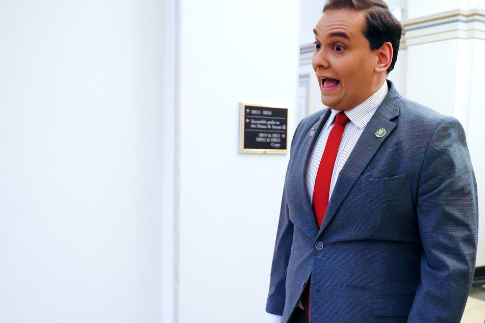 A former aide to George Santos has alleged that he paid the New York Republican's director of operations to get a job in his congressional office.