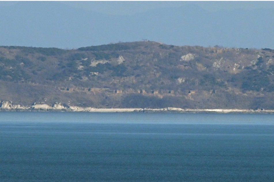 North Korea fires 60 rounds near South Korea island in fiery ramp up