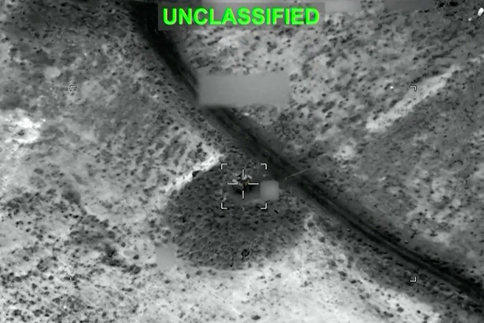 A screen grab taken from video footage shared by US Central Command on social media on July 13, 2026, purportedly shows US strikes against Iranian military installations.