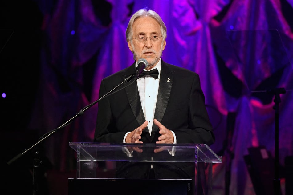 Former Grammys head accused of rape