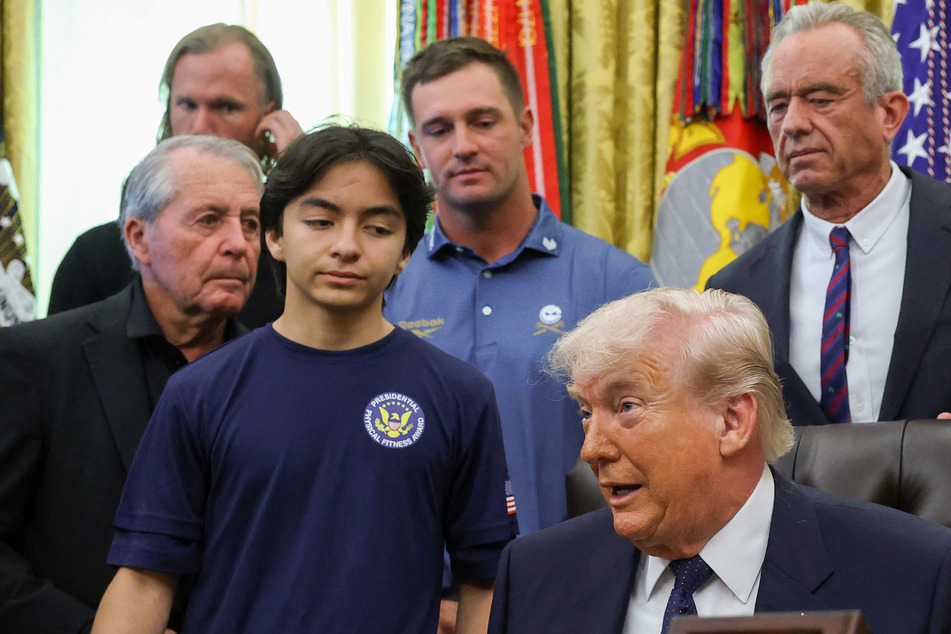 Trump says he exercises for "one minute a day max" as he pushes fitness test for kids