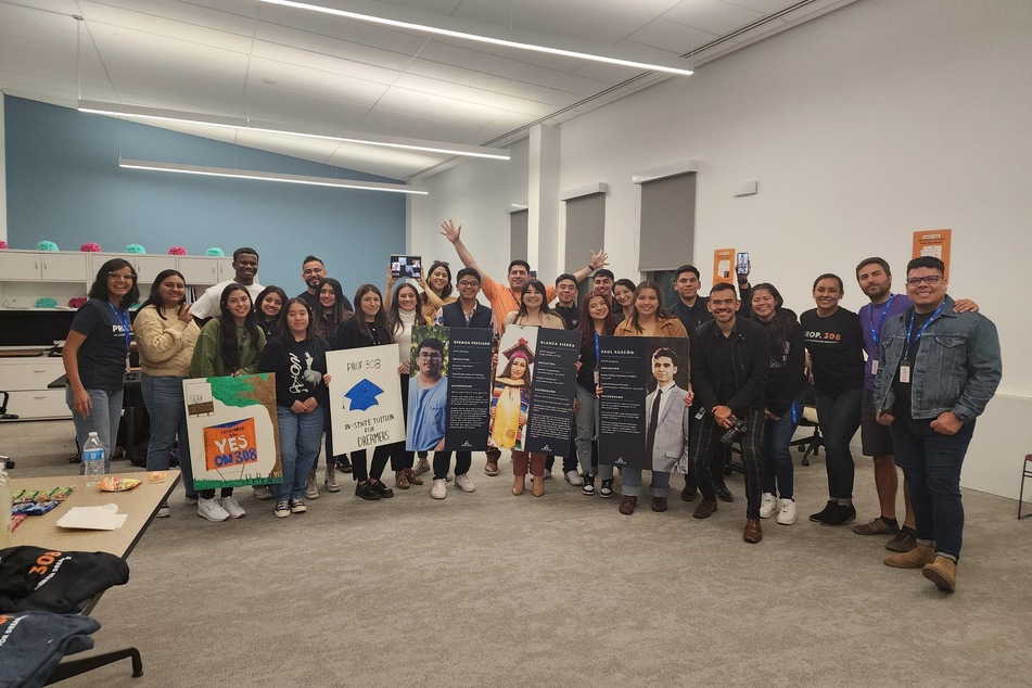 Aliento volunteers celebrate the passage of Prop 308 in Arizona.