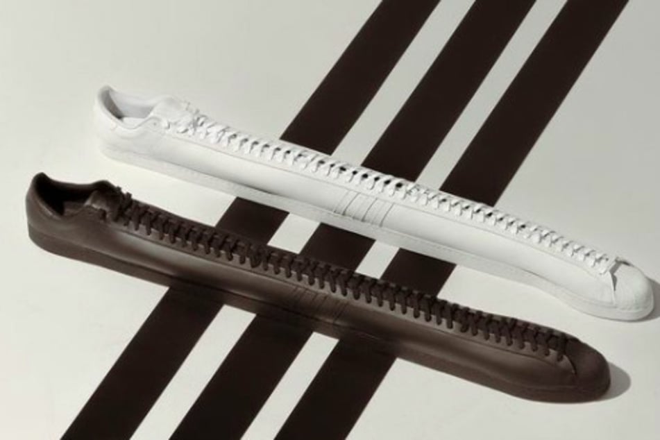 Rapper and Adidas kick up "the longest shoes in the world"