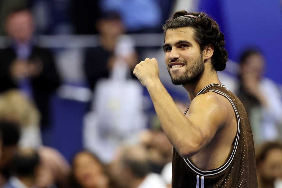 Spain's Carlos Alcaraz celebrates winning his second round match against Portugal's Jaime Faria (not pictured) at the US Open on September 2, 2026.