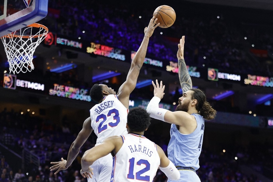 Charles Bassey of the Philadelphia 76ers blocks Steven Adams of the Memphis Grizzlies at Wells Fargo Center.