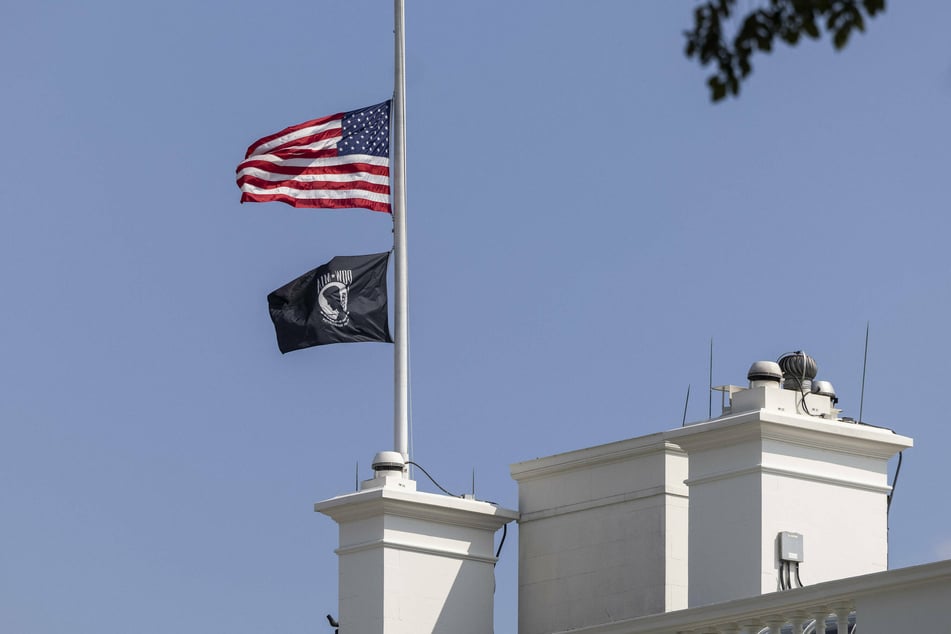 The US flag was flown at half-staff above the White House in Washington DC on Friday after a suicide bombing from ISIS-K killed more than 100 people, including 13 US troops, outside Hamid Karzai International Airport in Kabul.