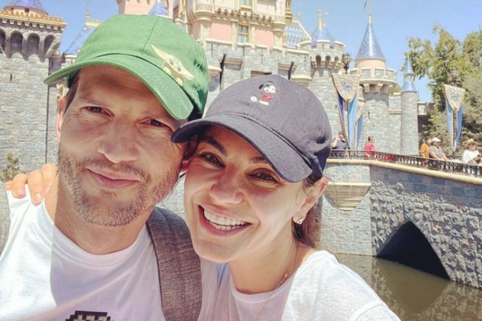 Ashton Kutcher (l) credits his wife Mila Kunis for being by his side after being diagnosed with vasculitis in 2019.