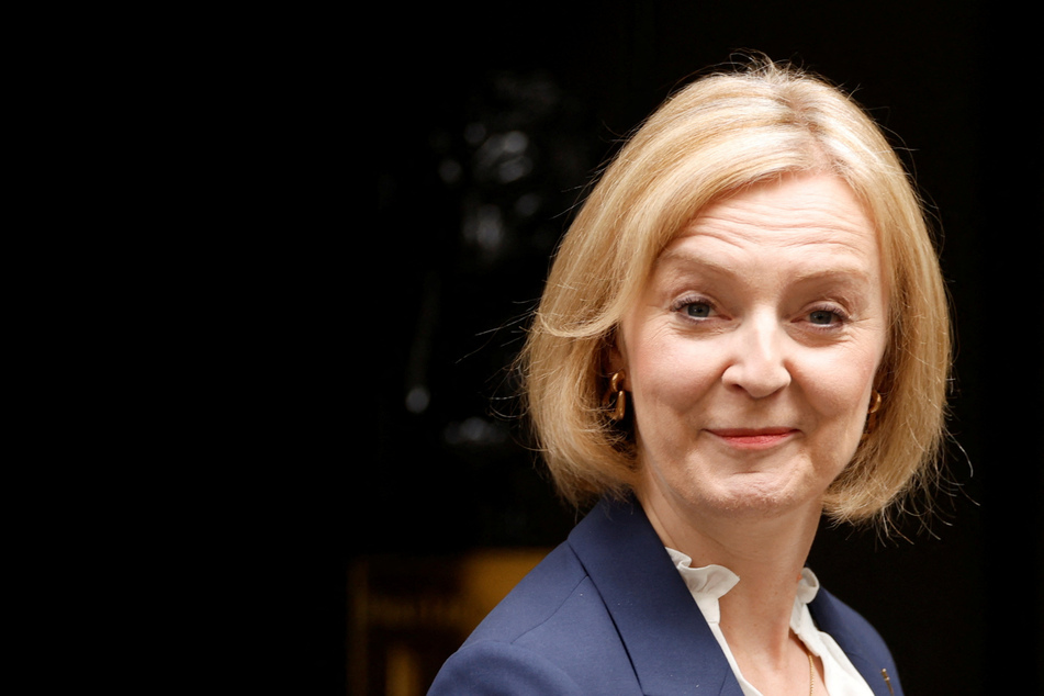 Liz Truss vows to "ride out the storm" in first speech as UK prime minister