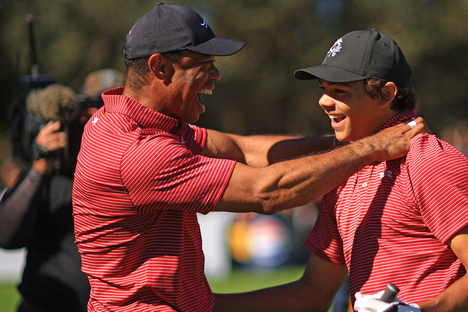 Charlie Woods (r.), the 16-year-old son of 15-time major winner Tiger Woods, won his first American Junior Golf Association (AJGA) title on Wednesday.