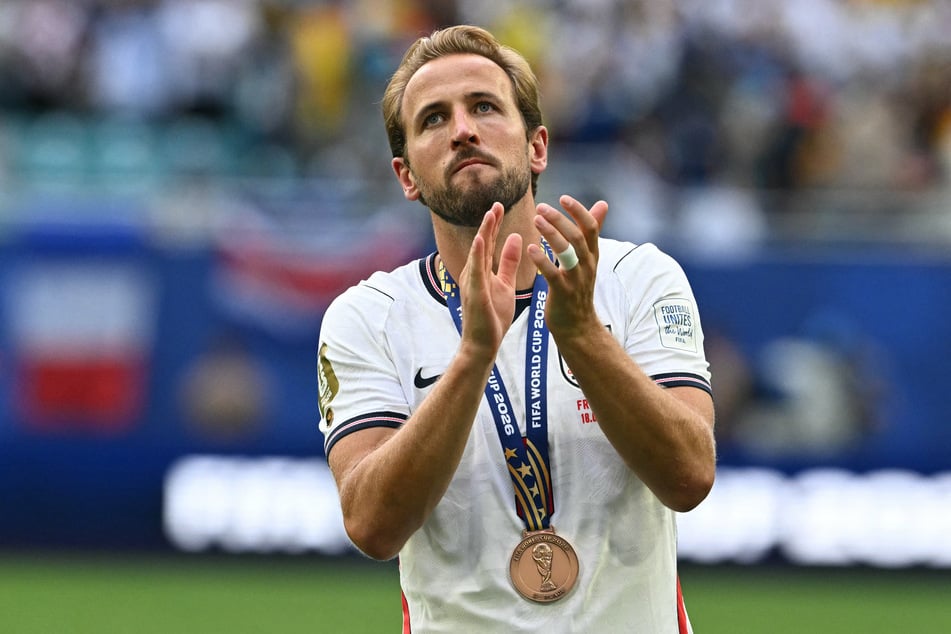 Harry Kane celebrates with his medal after winning World Cup bronze against France on July 18, 2026. The England forward said he is considering a career in the NFL after hanging up his soccer cleats.