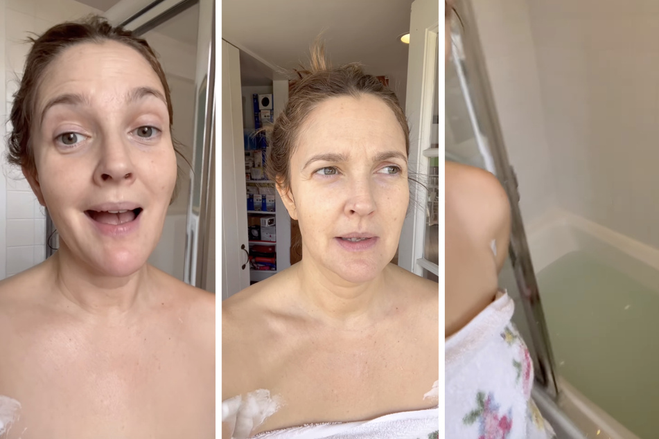 Wearing only a towel, Drew Barrymore was forced out of the bathtub by her house alarm.