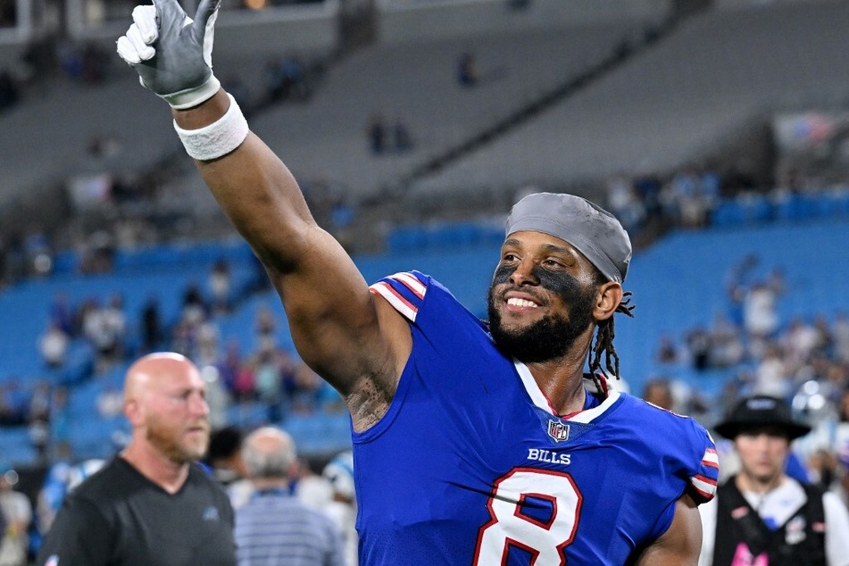 OJ Howard of the Buffalo Bills waves to a group of fans after a preseason game against the Carolina Panthers.