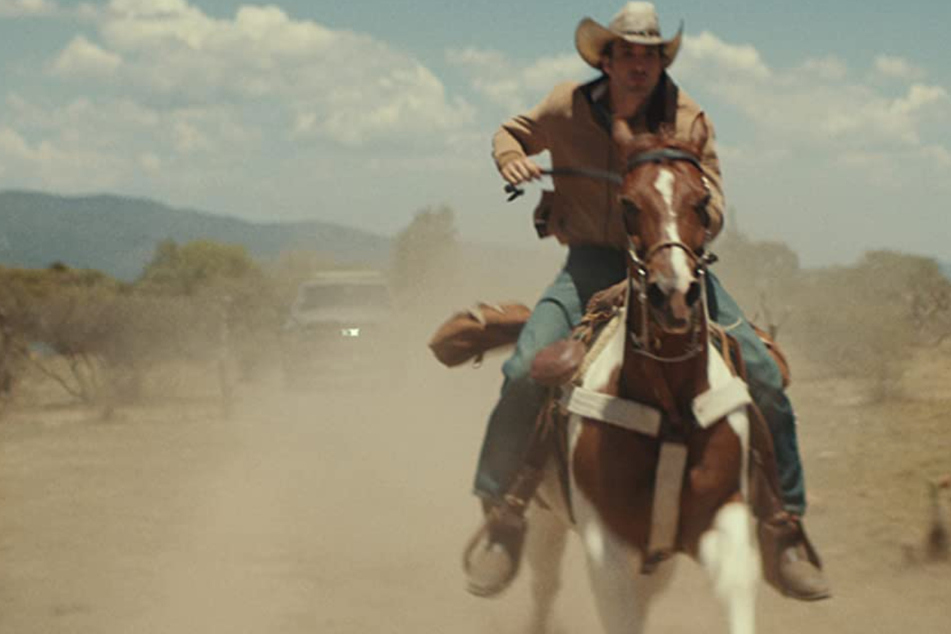 Jackson (Jake Allyn) flees from the police after accidentally shooting a Mexican boy.