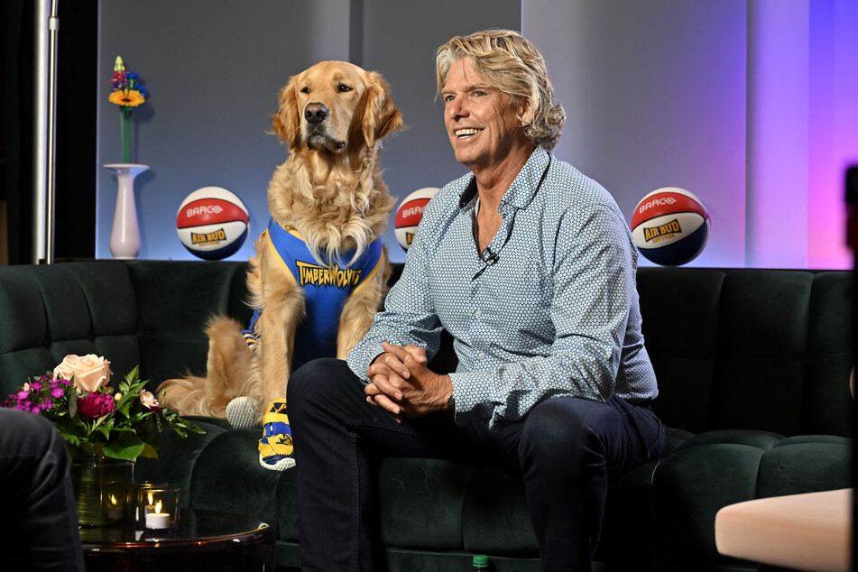 Robert Vince (r.), with Buddy, speaks during the CinemaCon 2026 - Air Bud Returns Event at The Dolby Colosseum at Caesars Palace on April 14, 2026.