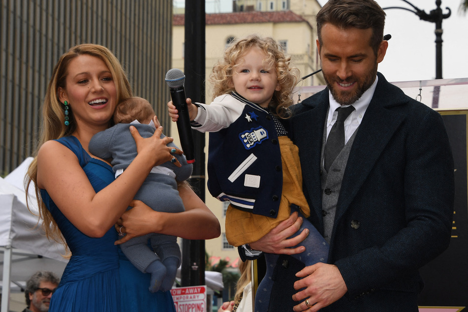 Ryan Reynolds loves to pull pranks but the Deadpool "creates magic" as dad, per his wife Blake Lively (l).
