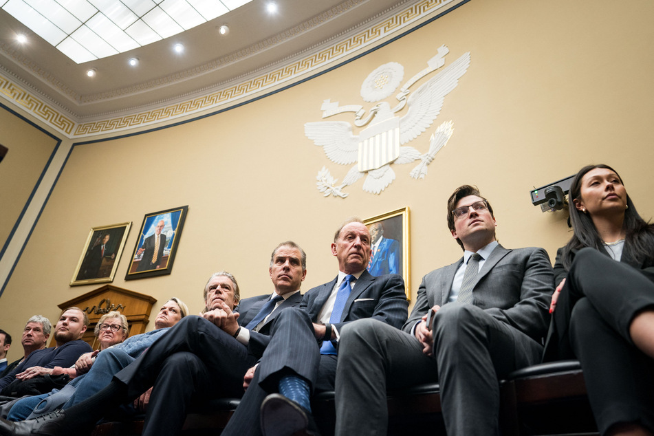 Hunter Biden (c) made an unexpected appearance at a House Oversight Committee hearing on Wednesday, which sent House Republicans into a frenzy.