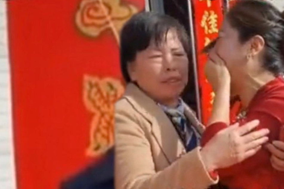 Woman reunited with long-lost daughter on son's wedding day – and it's the bride!