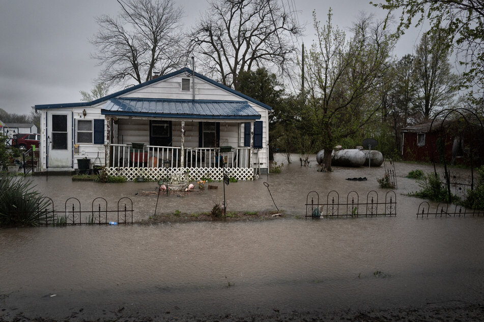 Water surrounds a home on April 5, 2025, in Wilson City, Missouri, amid severe flooding.
