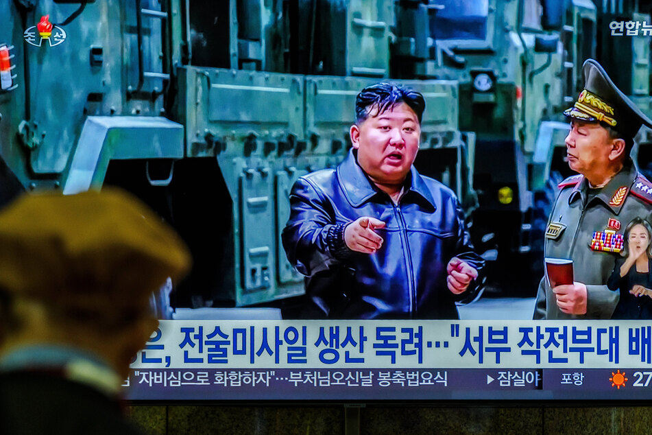 North Korean Kim Jong-un urged his country to ramp up military production to prepare for war as he inspected a tactical missile system Tuesday.