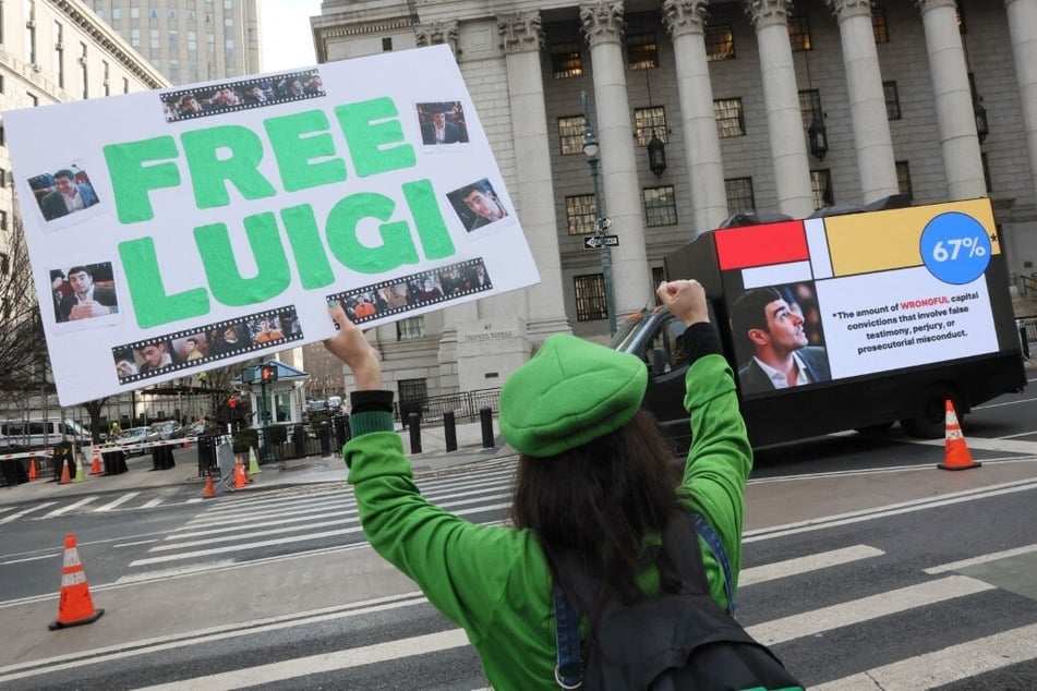 Supporters of Luigi Mangione are seen outside of Manhattan Federal Court on January 9, 2026 in New York City.
