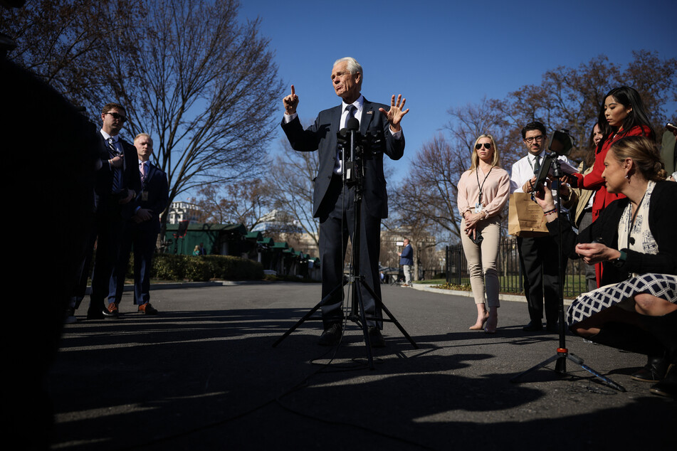 Trump's trade advisor, Peter Navarro, insisted tariffs on vehicle imports could raise hundreds of billions of dollars.