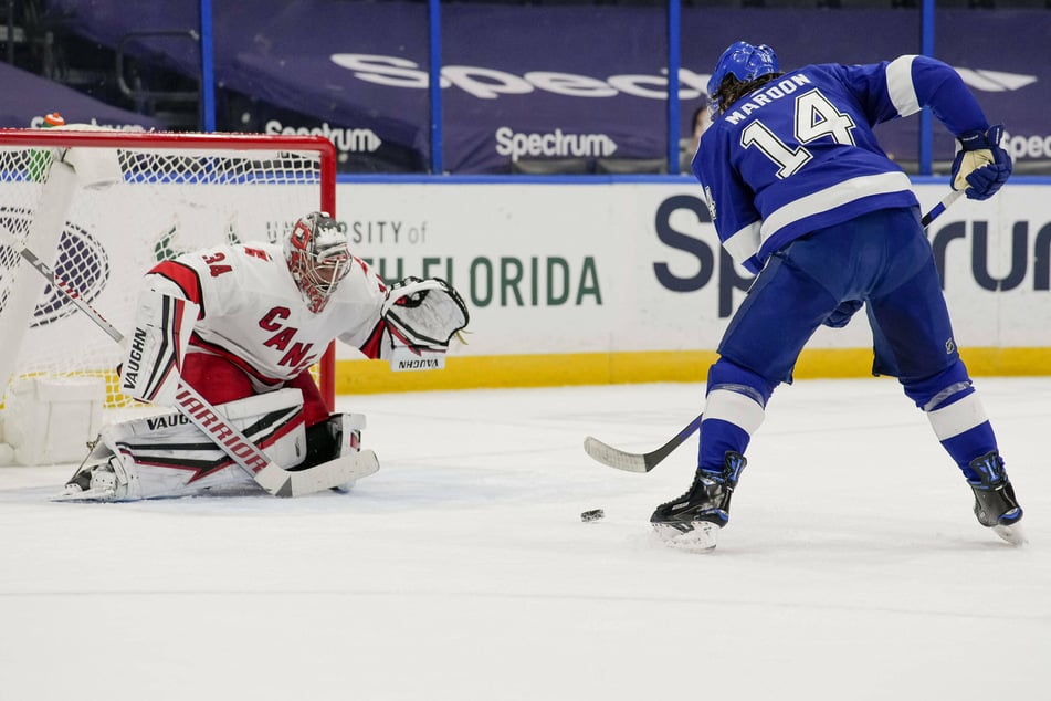 NHL: Lightning strikes in overtime as Tampa tries to keep up with Carolina in the Central Division