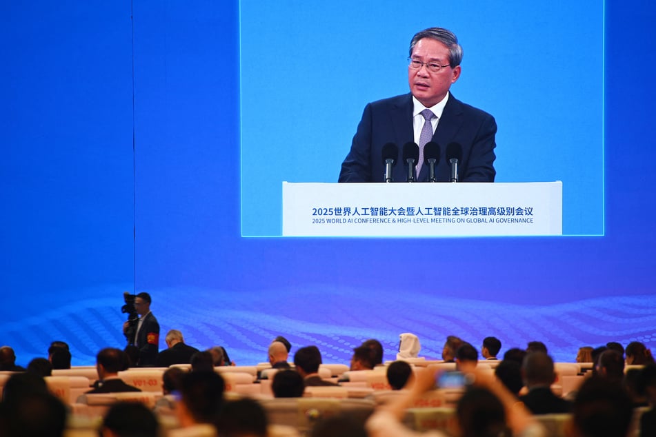 Chinese Premier Li Qiang is seen on a screen as he speaks at the opening ceremony of the World Artificial Intelligence Conference in Shanghai on July 26, 2025.