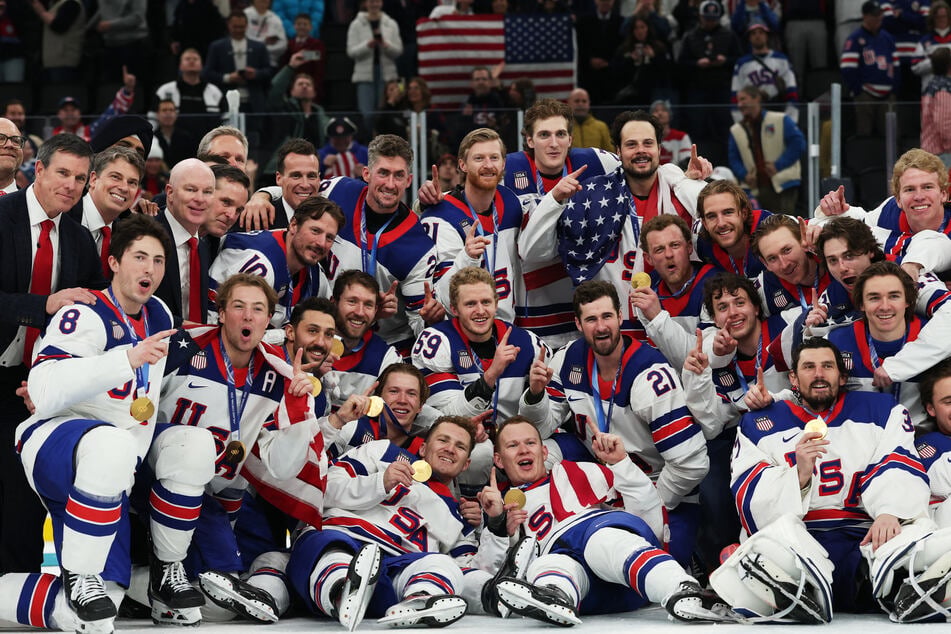 Team USA celebrates winning the gold medal in the men's ice hockey final at the Milan-Cortina Olympics on February 22, 2026.