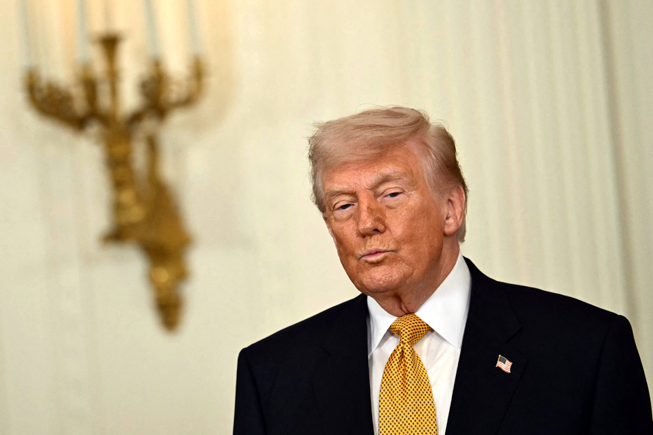 President Donald Trump participates in a Military Mother's Day Event in the East Room of the White House on Wednesday.