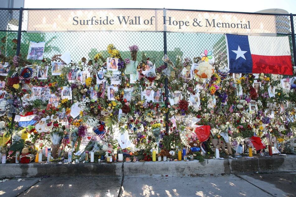 The makeshift memorial at the site of the disaster has been steadily growing over the past weeks.