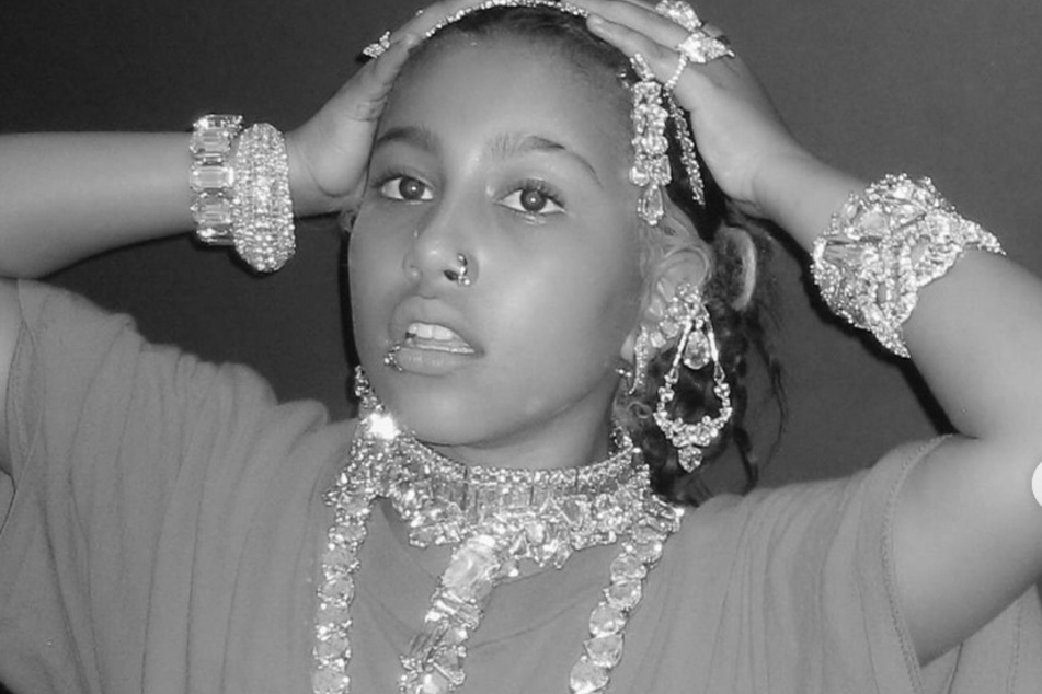 A photo of 10-year-old North West dripping in diamonds has sparked controversy online.