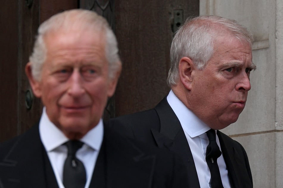 Britain's Prince Andrew, Duke of York (r.) and Britain's King Charles III (l.) leave following a Requiem Mass, a Catholic funeral service, for the late Katharine, Duchess of Kent, at Westminster Cathedral in London on September 16, 2025.