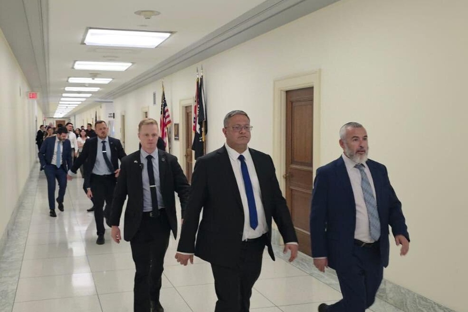 Israeli Minister of National Security Itamar Ben-Gvir (second from r.) walks the halls of Congress during his visit to the US.