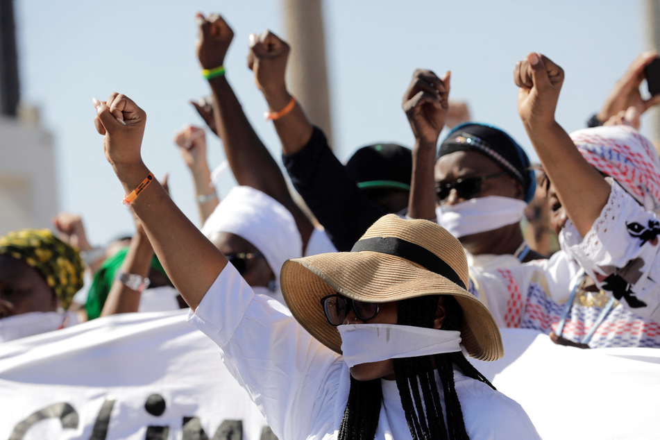 COP27 activists rally in solidarity with "silenced" rights advocates