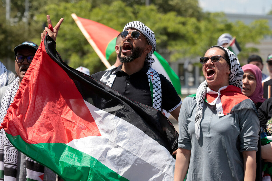 Protesters call for Palestinian freedom and an end to US weapons transfers to Israel at a rally in Dearborn, Michigan.