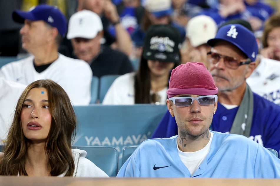 ... but also the sister-in-law of superstar Justin Bieber (r.).