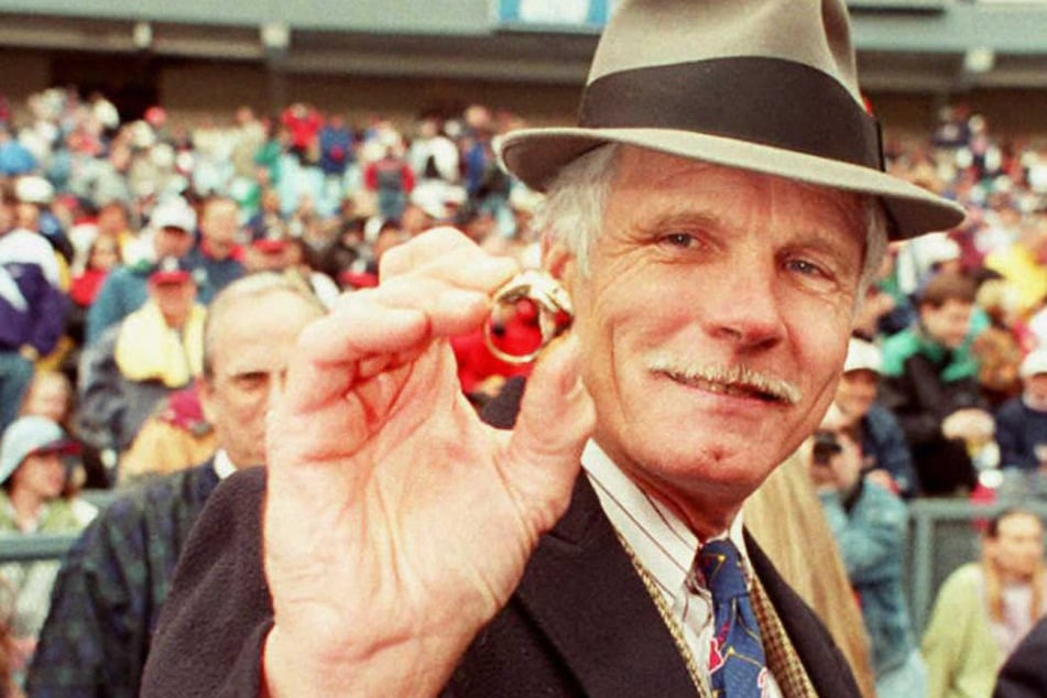 Ted Turner, who owned the Atlanta Braves, pictured showing off his 1995 World Series Championship ring.