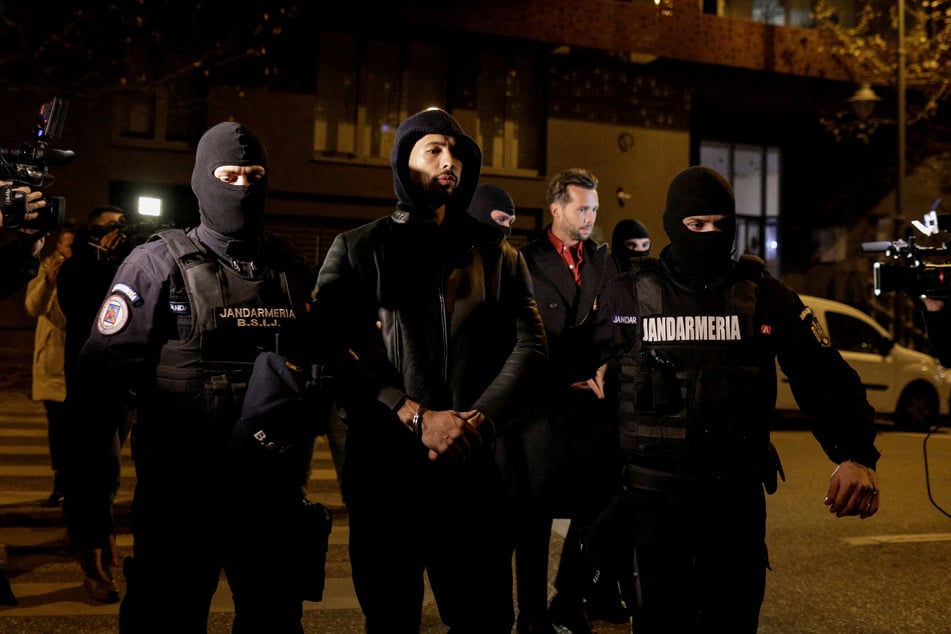 Andrew Tate has been detained by Romanian authorities for at least 24 hours.