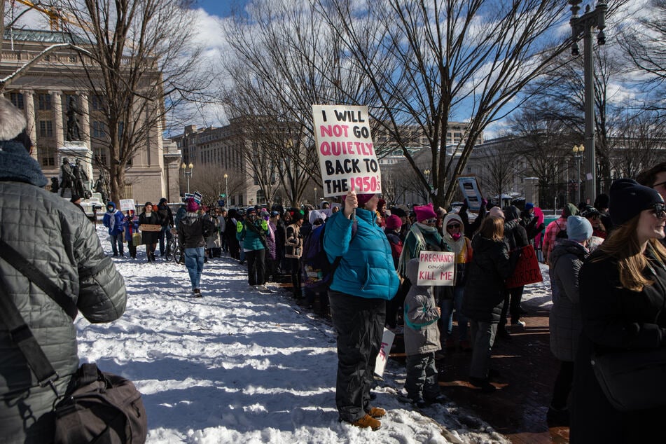 Abortion advocates marched in front of the White House to mark the anniversary of the 1973 passage of Roe v. Wade.