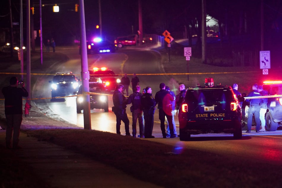 Police officers at the scene of the deadly shooting at Michigan State University.
