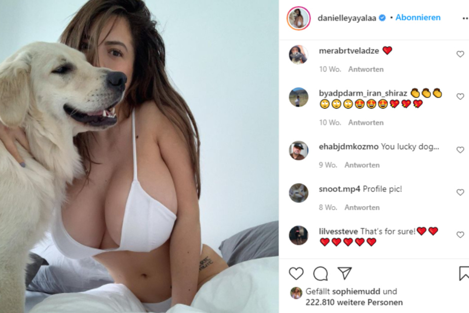 The curvy beauty loves dogs and other animals.