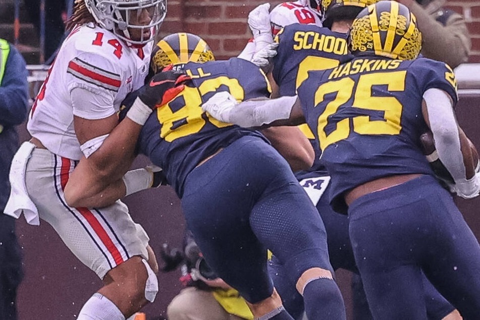 NCAA Football: Wolverines beat rival Buckeyes to spoil OSU's season finale