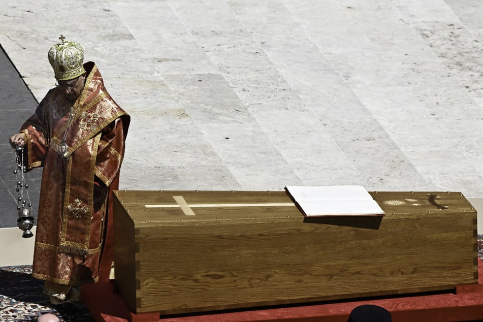 Melkite Greek Catholic Patriarch Youssef Absi blesses the coffin of Pope Francis during his funeral mass in St. Peter's Square at the Vatican.