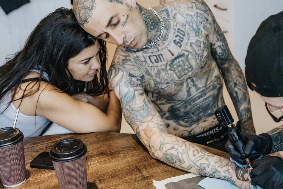 Kourtney Kardashian and Travis Barker (r) revealed in the new documentary, Louder Than Fear, that they were expecting a baby girl six months into their romance.