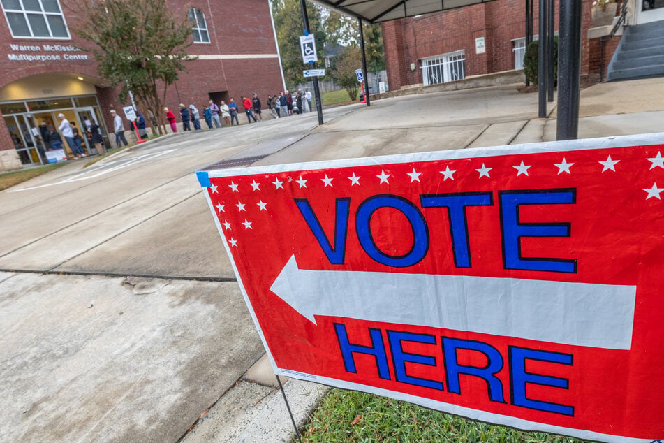 People line up to vote outside of a polling station at Greater Galilee Baptist Church in Charlotte, North Carolina, on November 5, 2024.