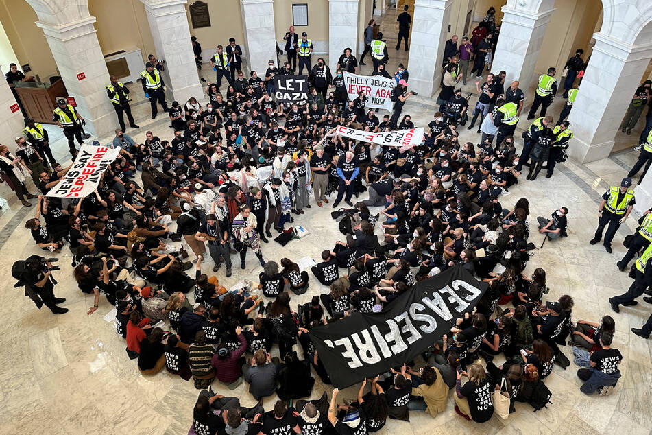 Hundreds of protesters occupied the Cannon House Office building to demand a ceasefire in the Israel-Gaza war.