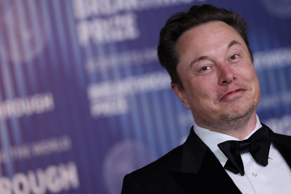 Elon Musk holds talks with Chinese Prime Minister in surprise visit to Beijing