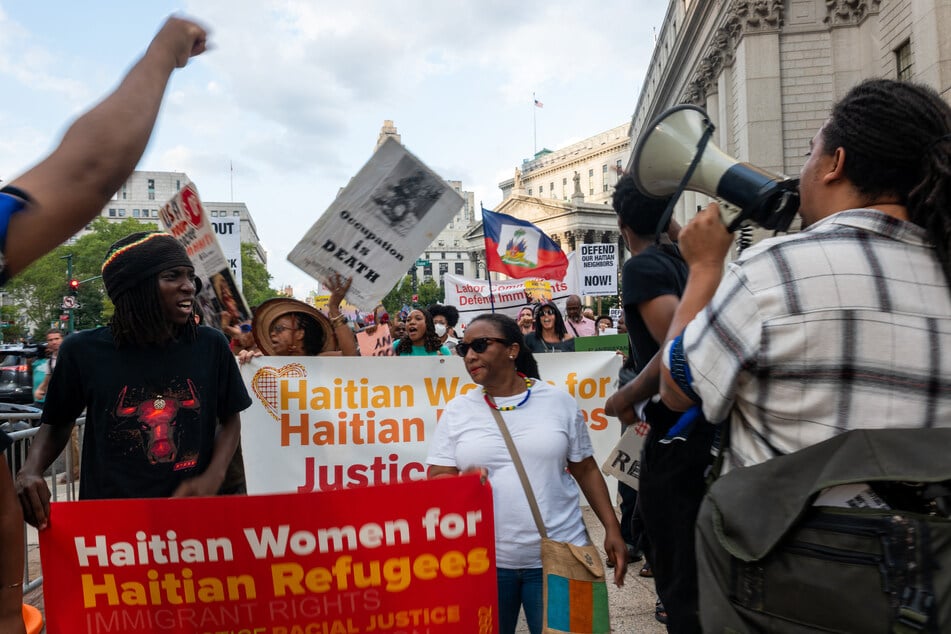 Haitians and supporters participate in a march in Manhattan to denounce the Trump administration's immigration crackdown on the Haitian community on August 28, 2026.