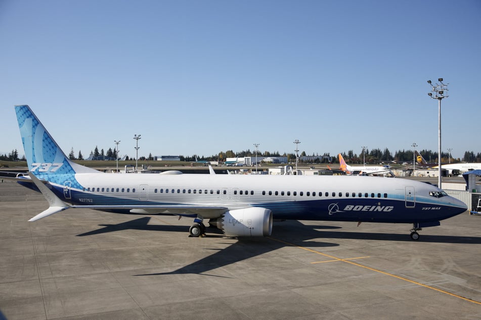 A Boeing 737 MAX 10 test aircraft stands on the tarmac during an event marking its FAA certification at Boeing's Everett Delivery Center in Washington on October 20, 2026.