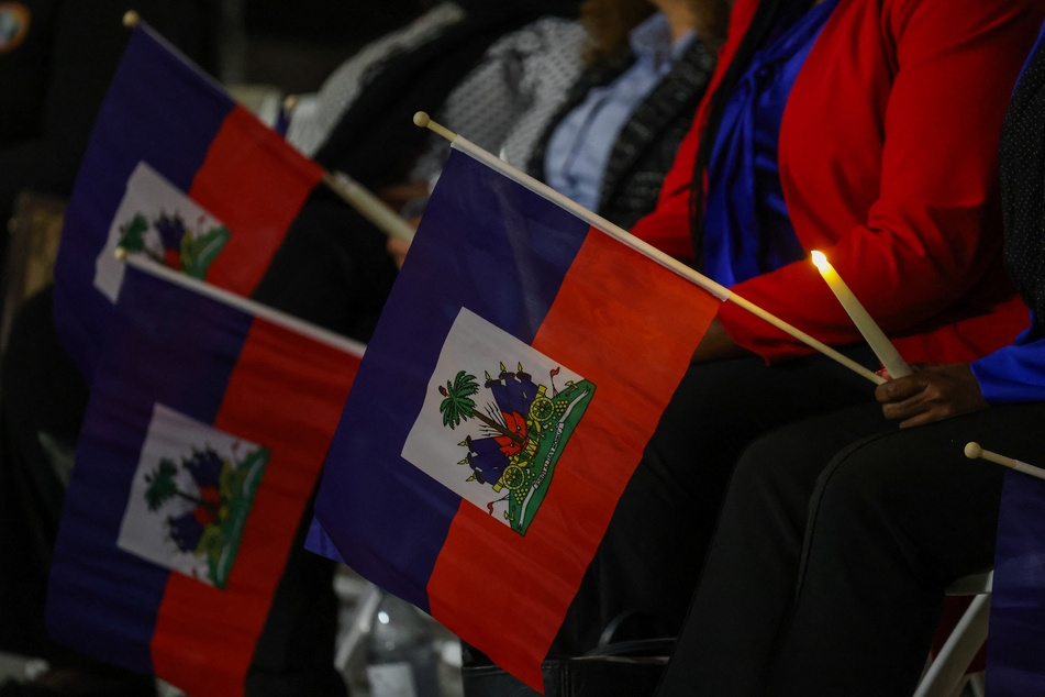 The US government's attempt to revoke vital legal protections for more than 350,000 Haitians has been blocked by a federal court.